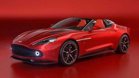 Sleek Red Aston Martin Roadster Wallpaper wallpaper