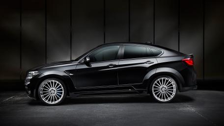 Sleek Black Sports Car Wallpaper wallpaper