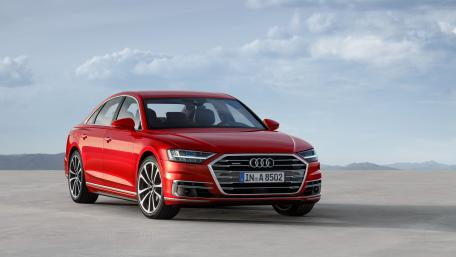 Sleek Red Audi A8 in Stunning Landscape wallpaper
