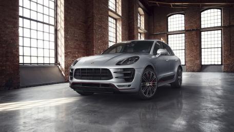 Sleek Silver SUV in Industrial Loft Space wallpaper