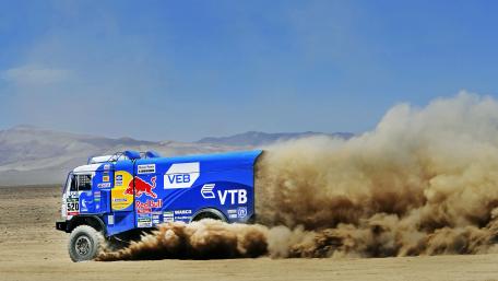 Thunderous Rally Truck in Action wallpaper