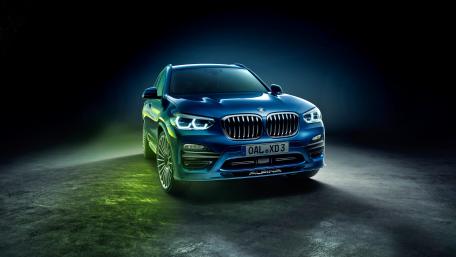 Sleek Blue BMW Car with Stunning Lighting Effects wallpaper