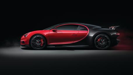 Sleek Red and Black Supercar Wallpaper wallpaper