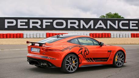 Dynamic Race-Ready Sports Car Wallpaper wallpaper