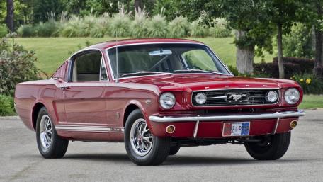 Classic Red Ford Mustang in Full Glory wallpaper