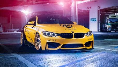 Dynamic Racing Aura with a Bold Yellow BMW wallpaper