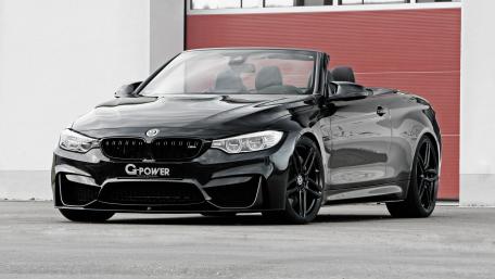Sleek Black Convertible Roadster Wallpaper wallpaper