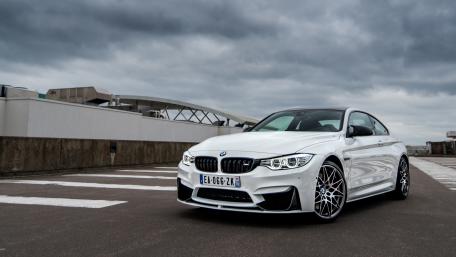 Sleek BMW M4 Coupé Under Dramatic Skies wallpaper