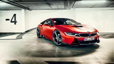 Sleek Red Sports Car in Parking Garage wallpaper