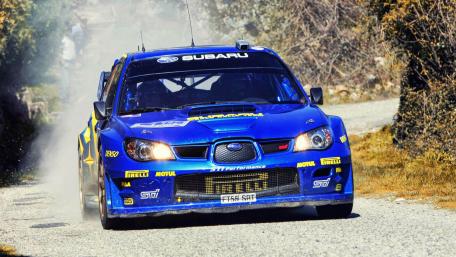 Racing Power Unleashed on Gravel Roads wallpaper