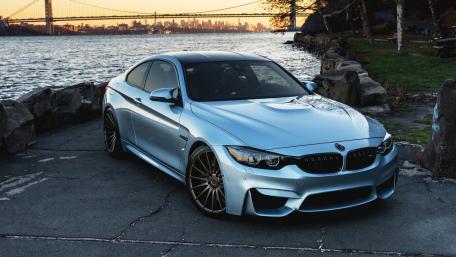 Sleek BMW M4 by the Waterfront at Sunset wallpaper