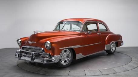 Classic Chevrolet Beauty in Vibrant Orange Shine wallpaper
