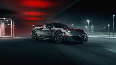 Sleek Nighttime Sports Car Wallpaper wallpaper