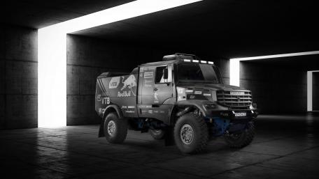 Powerful Rally Truck in a Modern Setting wallpaper