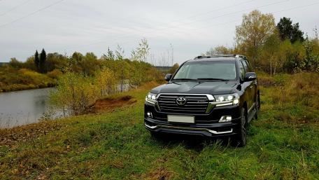 Sleek SUV by the Riverside wallpaper