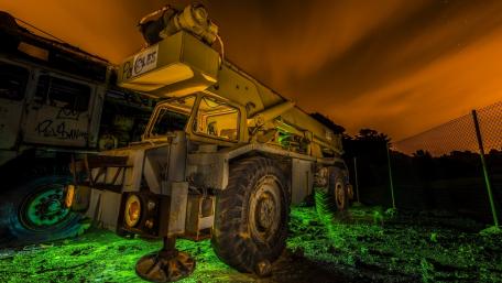 Rusty Crane Under a Dramatic Sky wallpaper