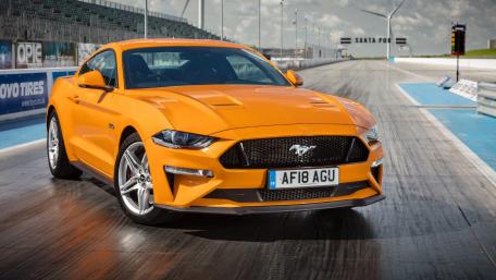 Sleek Mustang on the Race Track wallpaper