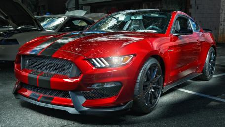 Sleek Red Racing Machine for Car Enthusiasts wallpaper
