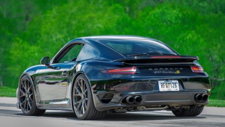 Sleek Black Porsche 911 Turbo S Wallpaper wallpaper