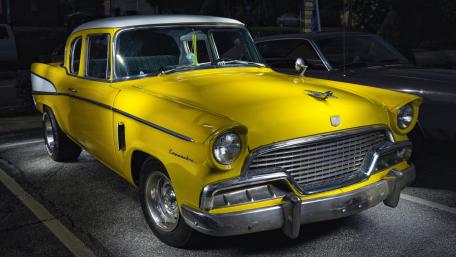 Classic Yellow Car with Gleaming Details wallpaper