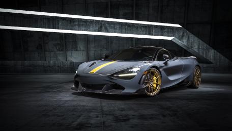 Sleek Gray Supercar in Urban Setting wallpaper
