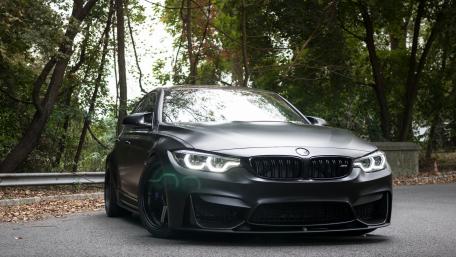 Sleek BMW in a Natural Setting wallpaper