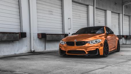 Sleek Orange BMW Sport Car Wallpaper wallpaper