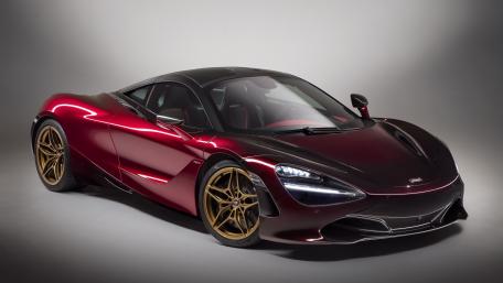 Sleek McLaren Supercar in Stunning Red Finish wallpaper