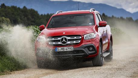 Bold Red Adventure Truck in Action wallpaper