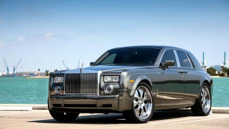 Sleek Luxury Rolls-Royce in Stunning Setting wallpaper