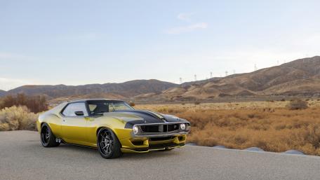 Classic Muscle Car in Majestic Landscape wallpaper