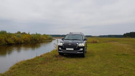Adventurous Ride by the Riverbank wallpaper