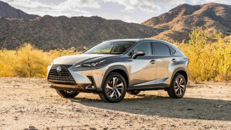Sleek Lexus NX in Desert Landscape wallpaper