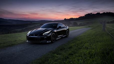 Ultimate Black Sports Car at Sunset wallpaper