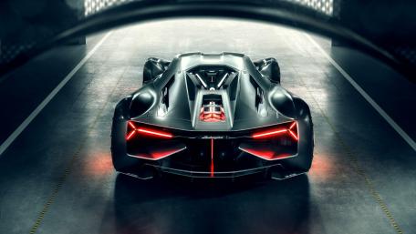Futuristic Lamborghini in a Dark Garage Environment wallpaper