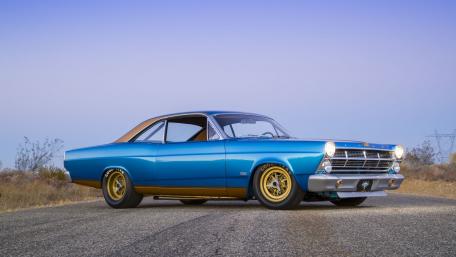 Classic Muscle Car on Open Road Scene wallpaper