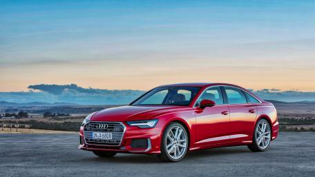 Sleek Red Audi A6 Against a Stunning Horizon View wallpaper