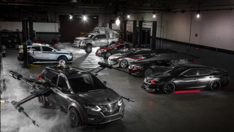 Futuristic Garage Full of Modified Vehicles wallpaper