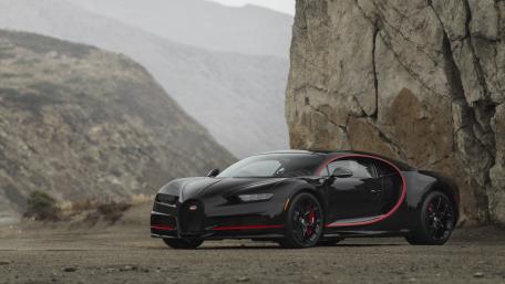 Sleek Elegance of a Black Supercar wallpaper