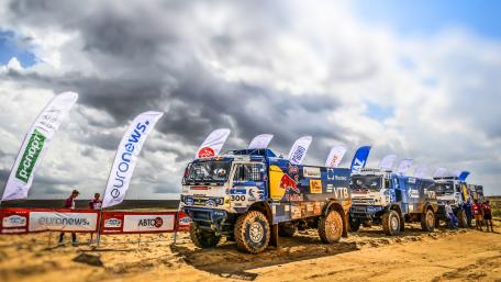 Rugged Trucks Conquer the Desert Landscape wallpaper