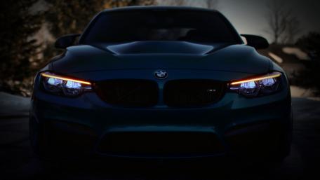 Sleek Dark BMW M4 Front View Wallpaper wallpaper