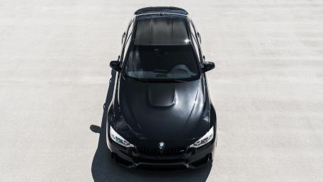 Sleek Black BMW M4 from Above wallpaper