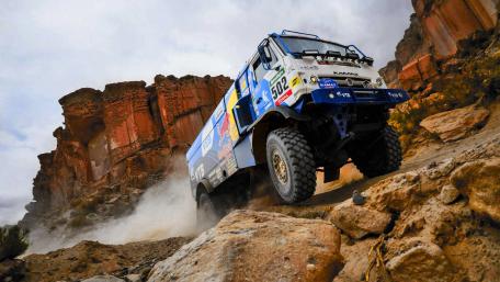 Adventurous Rally Truck in Action wallpaper