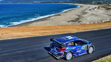 Dynamic Coastal Racing Adventure Wallpaper wallpaper