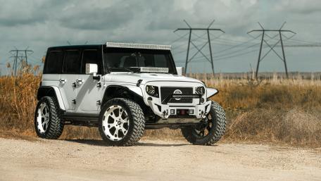 Robust SUV on an Open Terrain wallpaper