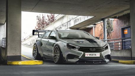 Sleek Silver Racing Car Wallpaper wallpaper