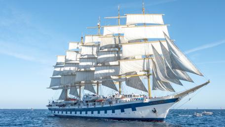 Majestic Tall Ship Sailing Through Clear Waters wallpaper