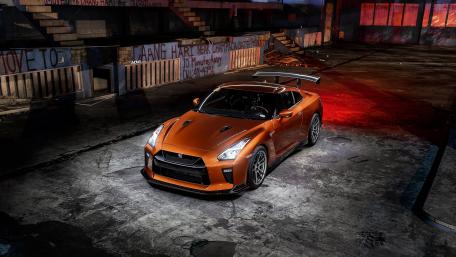 Dynamic Car in Urban Setting with Striking Lights wallpaper