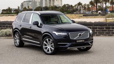 Sleek Volvo SUV Against Coastal Background wallpaper