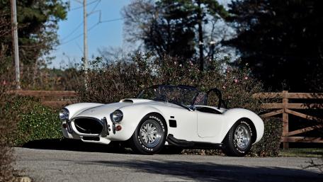 Classic White Sports Car in Nature Scene wallpaper